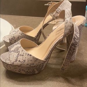 Snakeskin pumps